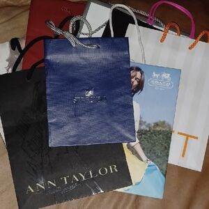 9 store paper bags from different retailers